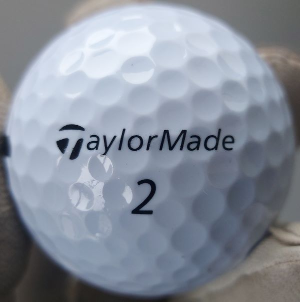 TaylorMade Distance Plus Logo