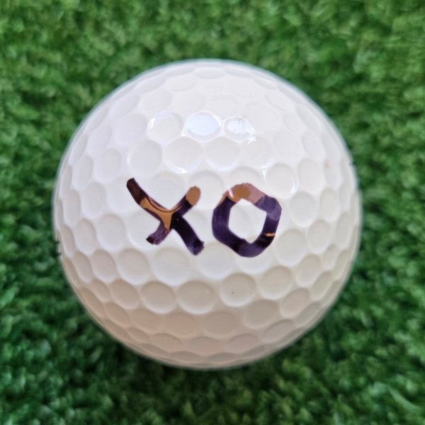 x and o marking on a golf ball