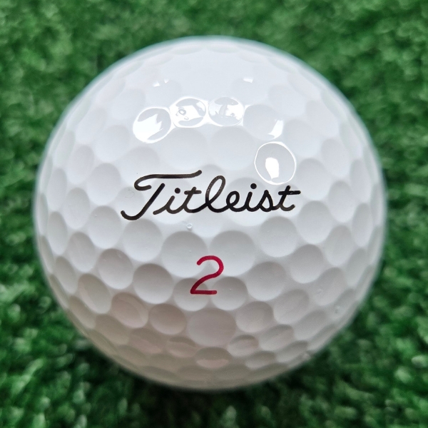 2025 Titleist Pro V1x golf ball golf ball showing the Titleist logo and ball number (2)