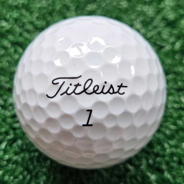 2024 Titleist Tour Soft Golf Ball showing the Titleist logo and the ball number on the ball