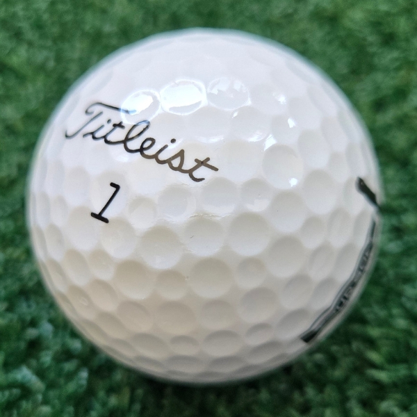 2024 Titleist Tour Soft Golf Ball showing marks and scuffs on the ball after a round of golf