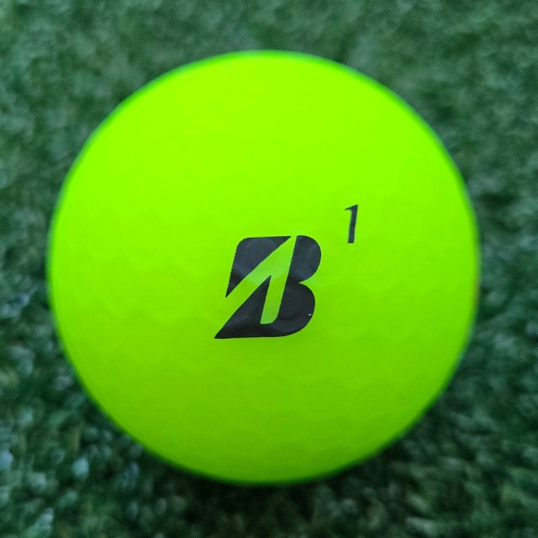 2025 Bridgestone e12 Straight Matte Green Golf Ball showing the Bridgestone logo and ball number