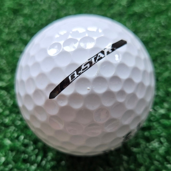 2025 Srixon Ultispeed Golf Ball showing scuffs and marks on the ball after a round of golfing