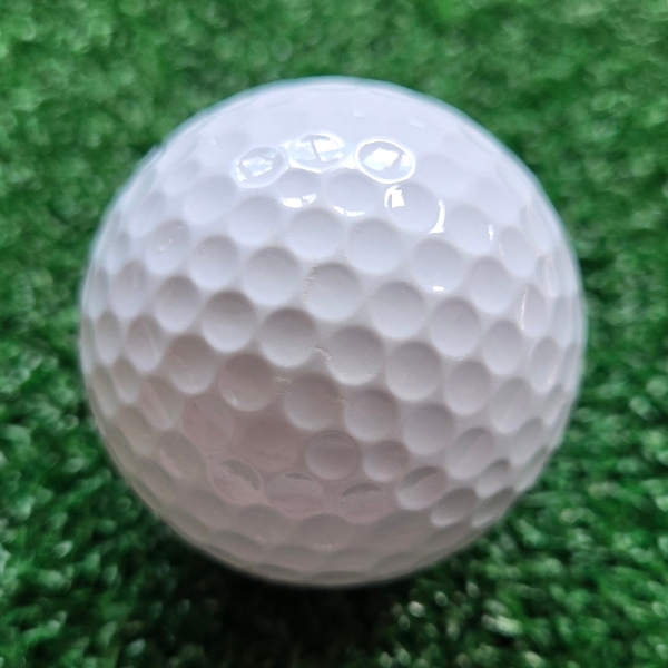 2024 Vice Pro Plus Golf Ball showing marks and scuffs on the golf ball after a round of golf