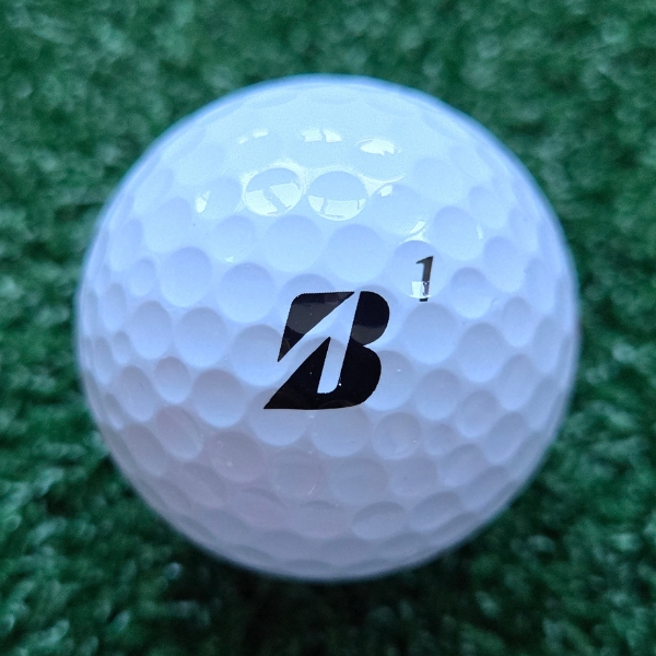 2025 Bridgestone e12 Speed Golf Ball showing the Bridgestone logo and the ball number (1)