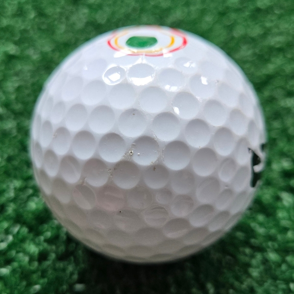2025 Bridgestone e12 Speed Golf Ball showing scuffs and marks on the golf ball after a round of golf