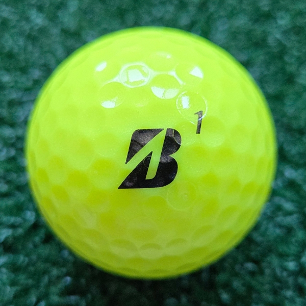 2025 Bridgestone e6 Soft Optic Yellow Golf Ball showing the Bridgestone logo and the ball number