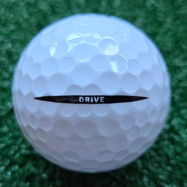 2024 Vice Drive Golf Ball showing the putting alignment that says "Drive" inside a black line with pointy edges on each side