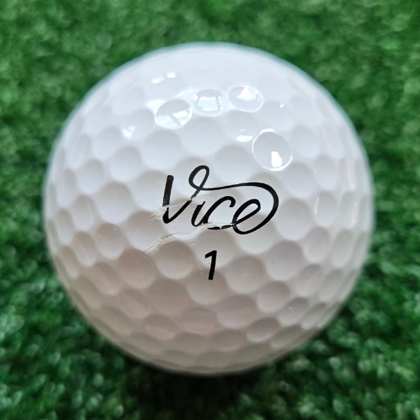 2024 Vice Pro Golf Ball showing marks and scuffs on the ball after a round of golf