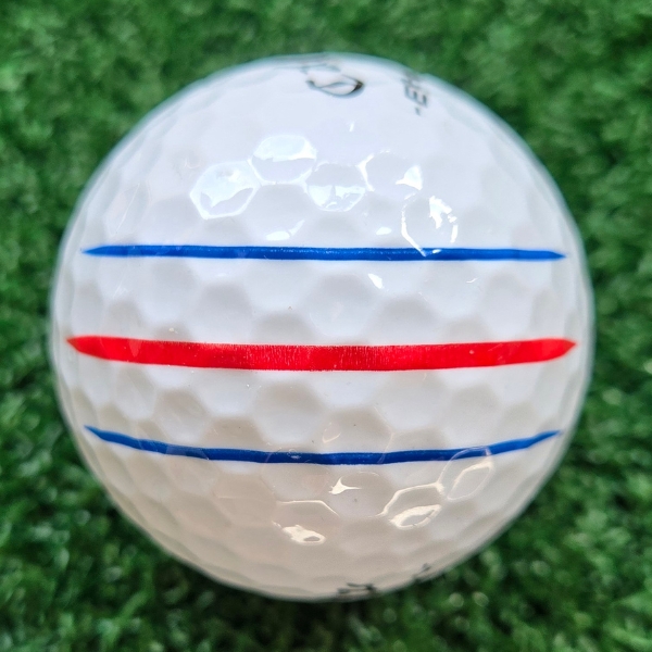 2025 Callaway ERC Soft Golf Ball showing the putting alignment on the ball, one red line between two blue lines