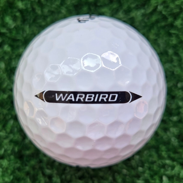 2025 Callaway Warbird Distance Plus showing the putting alignment which consists of a black line with the text "Warbird" in white capital letters inside of it
